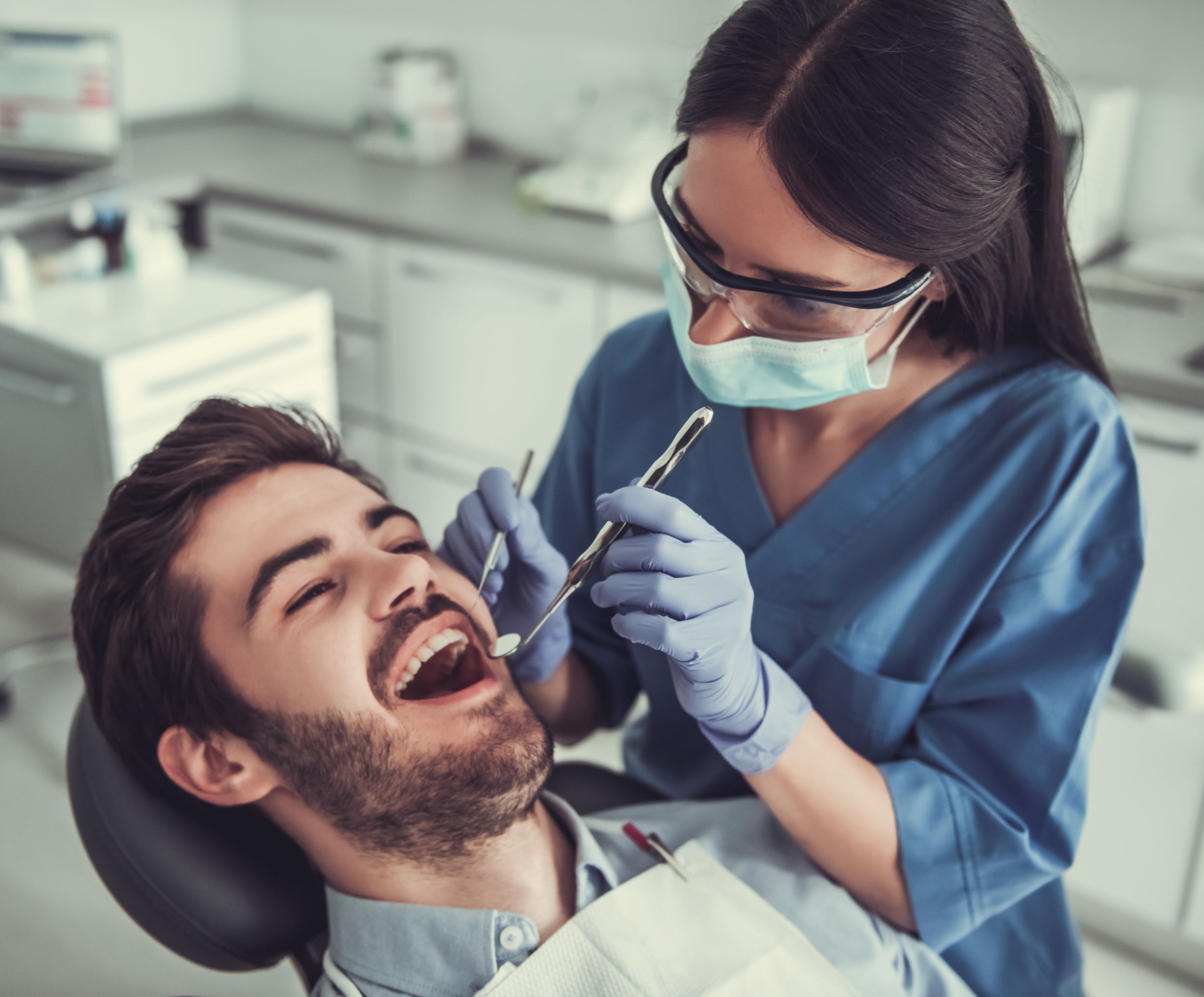 Dentist attending to a patient